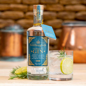 Sandringham Gin, distilled in the Royal Estate using sharon fruit and myrtle grown in our walled garden. Served here over ice with rosemary and lemon.