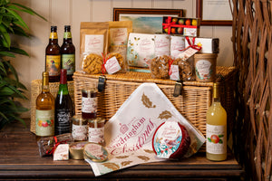 Sandringham Luxury Christmas Hamper in a traditional wicker hamper with food and drink from the Queen's Royal Estate in Norfolk.
